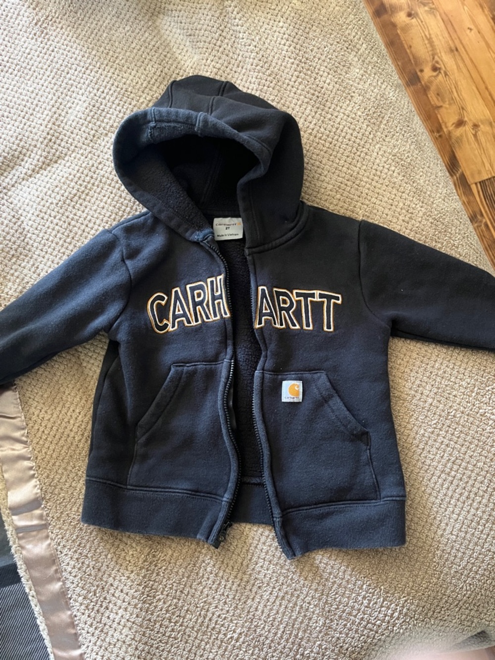 Carhartt Kids black hooded Zip Sweatshirt with Logo